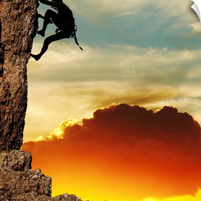 Woman Rock Climbing at Sunset