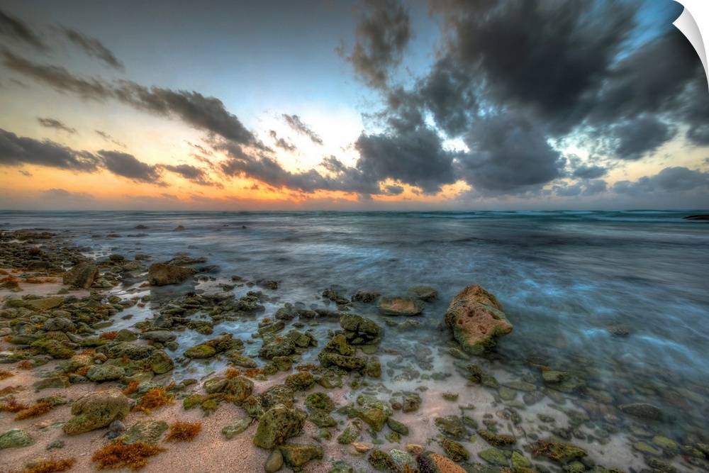 Sunrise in the Mayan Rivera beach front with a beautiful ocean view and sky.
