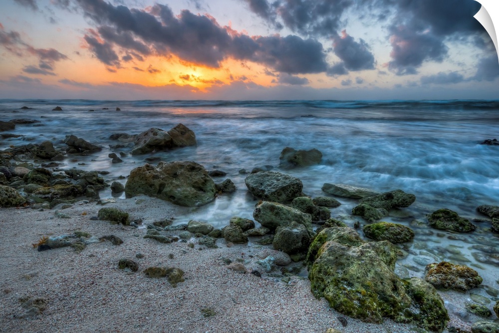Sunrise on the Mayan Riviera beach front with a beautiful ocean view and sky.