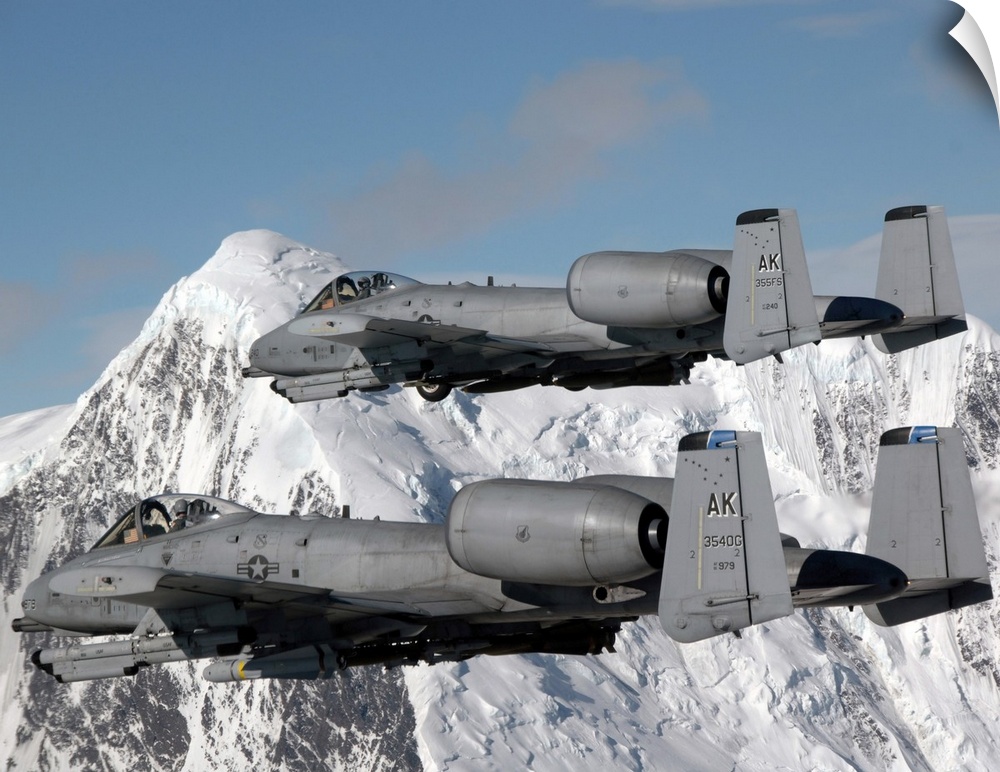 April 24, 2007 - Two A-10 Thunderbolt IIs fly over the Pacific Alaska Range Complex during live-fire training.