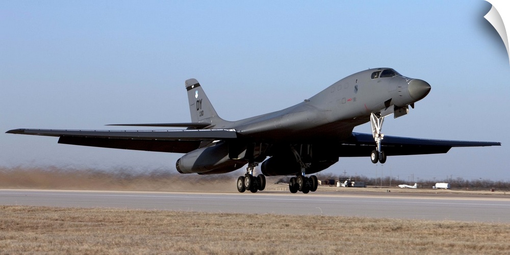 A 7th Bomb Wing B-1B Lancer takes off in the late afternoon from Dyess Air Force Base, Texas.