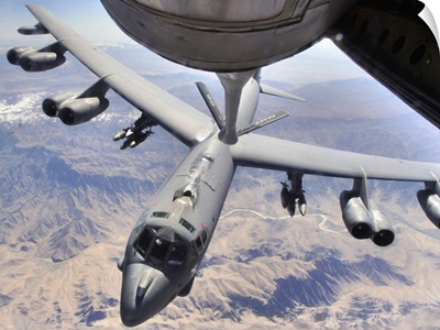 A B52 Stratofortress receives fuel from a KC135 Stratotanker over Afghanistan