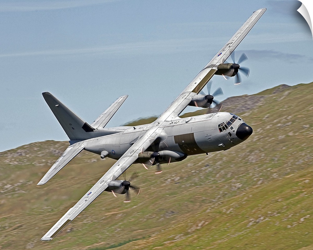 A C-130J Super Hercules low flying over North Wales on a training flight. The C-130J is a comprehensive update of the vene...