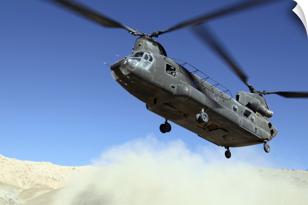 January 9, 2011 - A CH-47 Chinook comes in for a landing to pick up soldiers following a mission to the Daymirdad District...