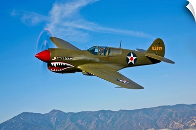 A Curtiss P-40E Warhawk in flight near Chino, California