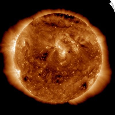 A dark rift in the suns atmosphere known as a coronal hole