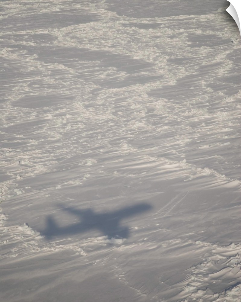 A DC-8 aircraft casts its shadow over the Bering Sea.