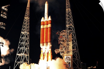A Delta IV Heavy rocket lifts off