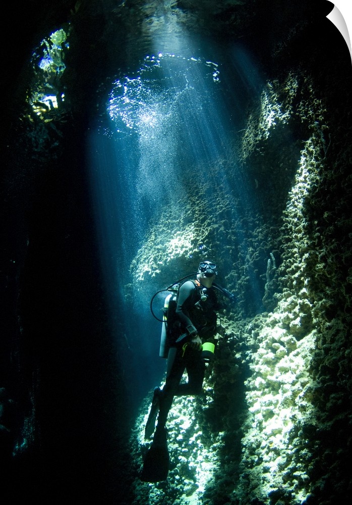 A diver explores the Lerus Cut underwater cavern, Solomons.