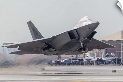 A F-22 Raptor of the U.S. Air Force launches from Nellis Air Force Base, Nevada