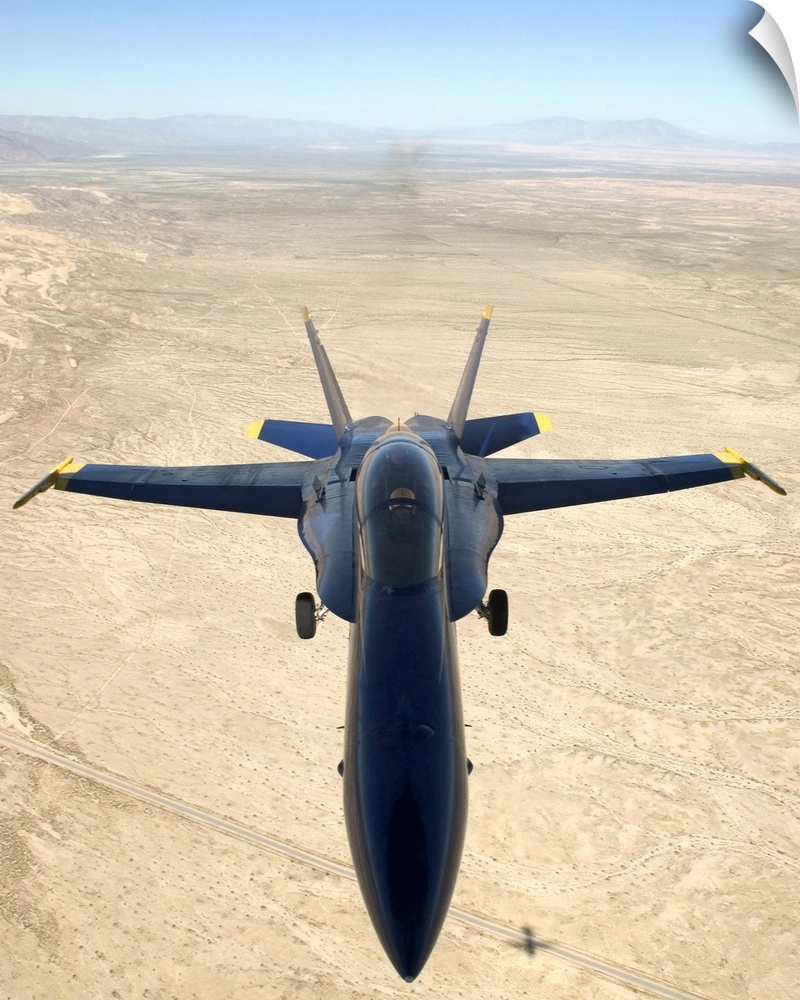 A F/A18A Hornet flys over the desert landscape of Imperial Valley