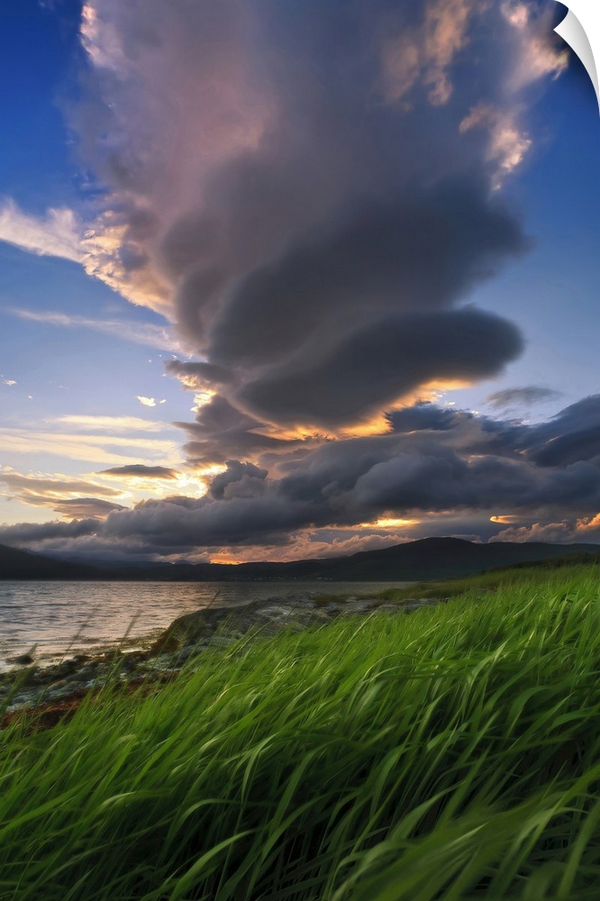 A giant stacked lenticular cloud over Tjeldsundet, Troms County, Norway.