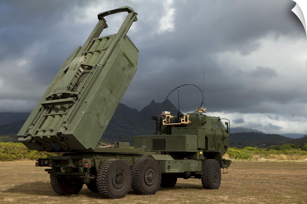 A M142 High Mobility Artillery Rocket System (HIMARS) conducts dry fire exercises in support of infantry units in simulate...