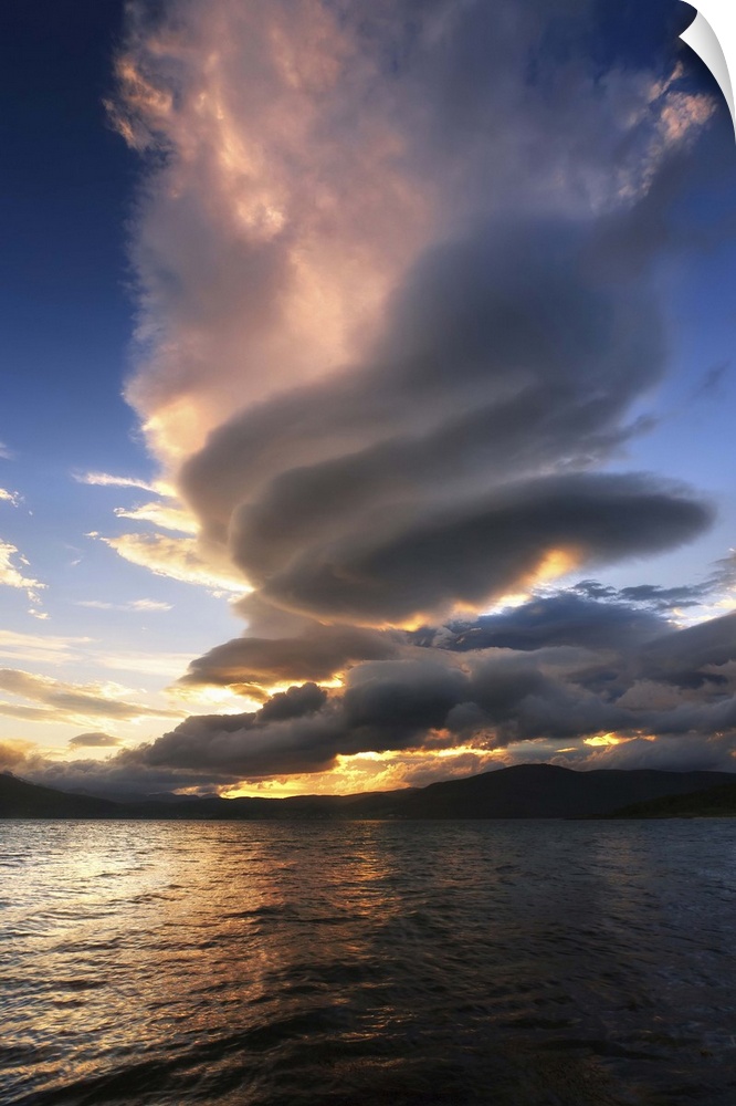 A massive stacked lenticular cloud over Tjedsundet in Troms County, Norway.