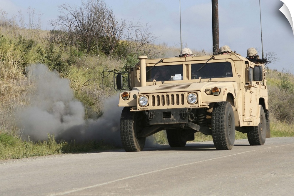 April 1, 2009 - A mock improvised explosive device explodes in the window of a humvee as part of convoy training at Camp P...