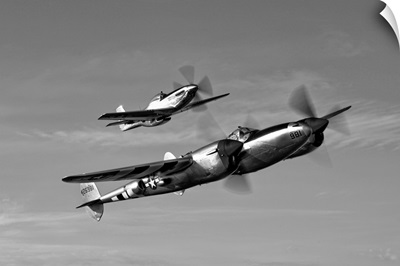 A P 38 Lightning and P 51D Mustang in flight