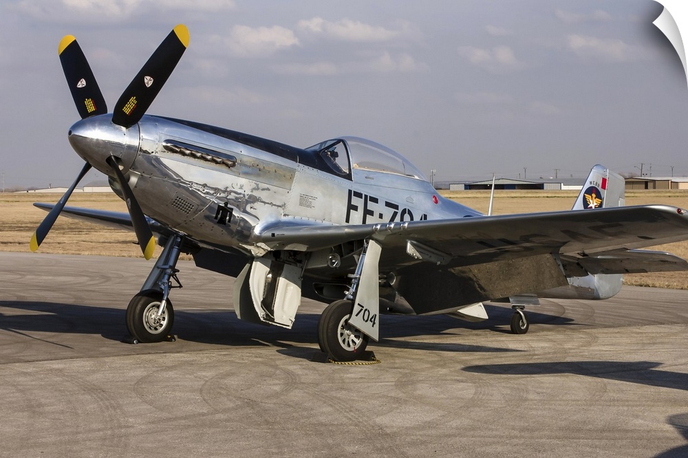 A P-51 Mustang parked on the ramp at Arlington, Texas.