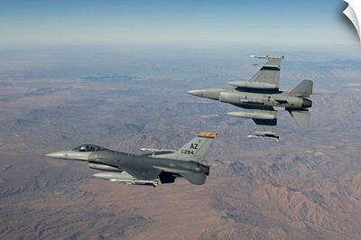 A pair of F-16s fly in formation over Arizona