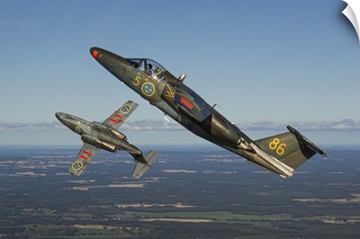 A Pair Of Swedish Air Force Sk60 Training Jets On A Formation Flight