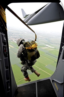 A Paratrooper Executes An Airborne Jump Out Of A C-17 Globemaster III