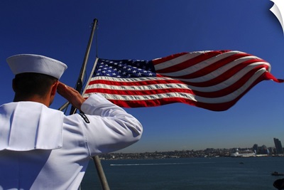 A Sailor Salutes The American Flag