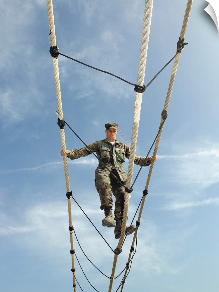A soldier navigates an obstacle on  the training course.