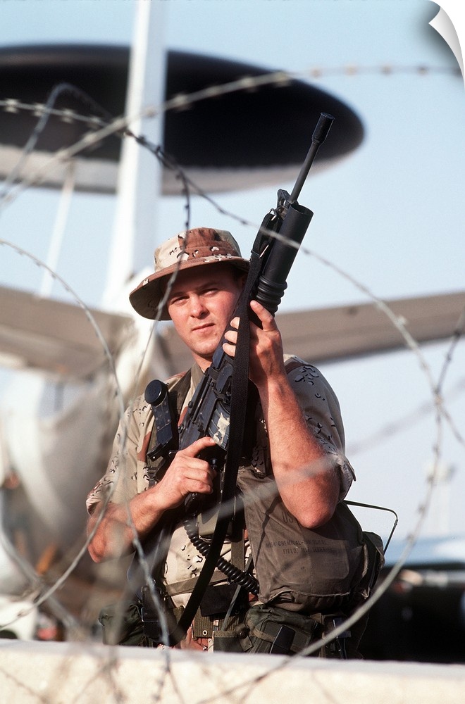 A soldier posts security during Operation Desert Storm.