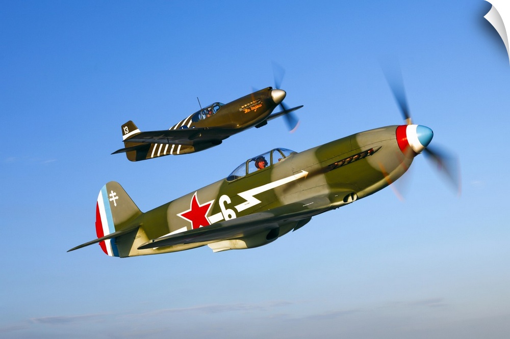 A Soviet Yakovlev Yak-3 and a P-51A Mustang in flight over Chino, California.