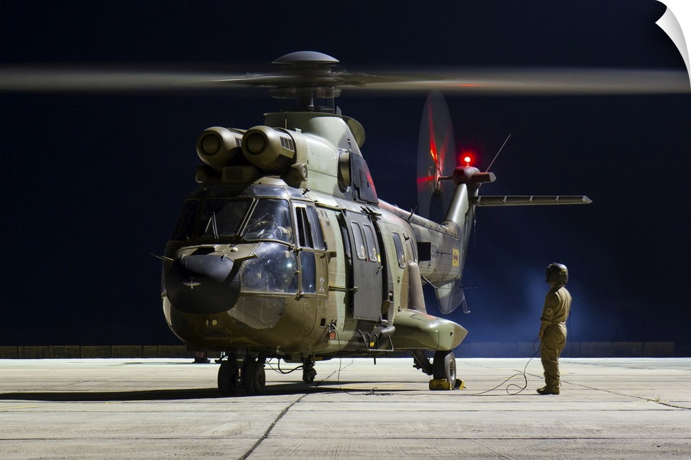 A Spanish Army AS332 Super Puma preparing to take off from Arrecife airport in the Canary Islands.
