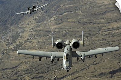 A twoship A10 Thunderbolt II formation flies a combat mission over Afghanistan