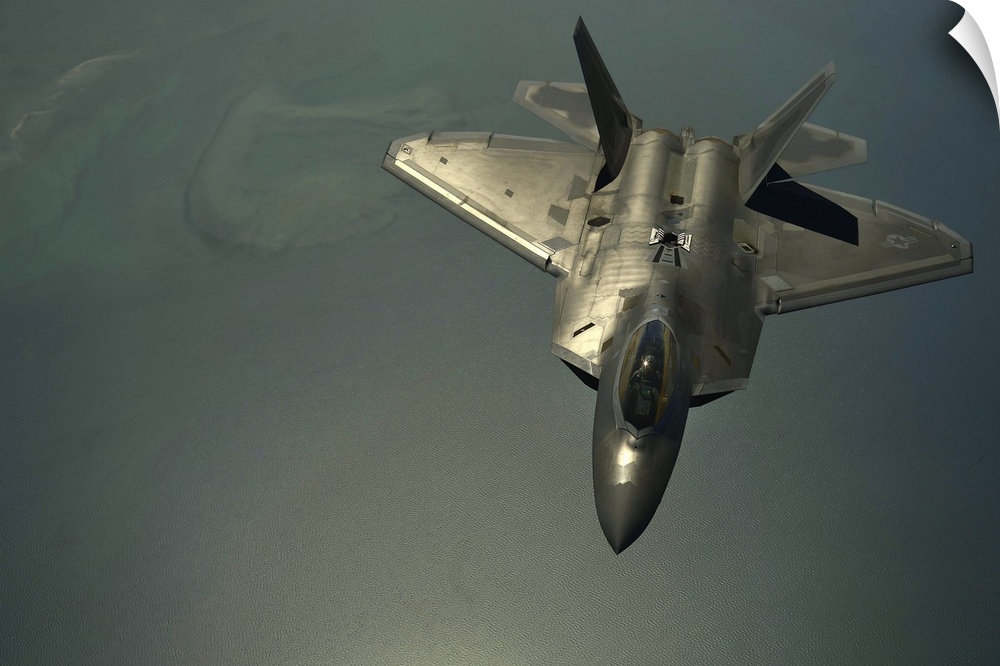 April 25, 2014 - A U.S. Air Force F-22 Raptor flies after being in-air refueled over the U.S. Central Command Area of resp...