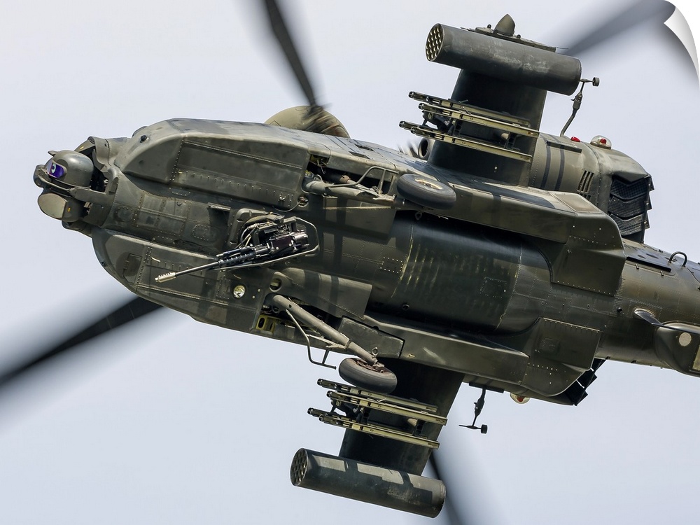 A U.S. Army AH-64D Apache Longbow pulls into a turn over Cleveland, Ohio.