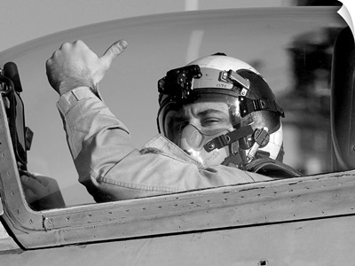 A US Marine Corps pilot gives a thumbsup signal prior to launching