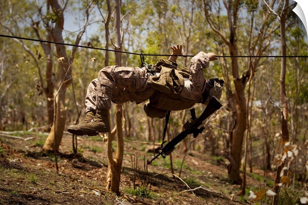 October 11, 2012 - A U.S. Marine participates in a gorge crossing demonstration during exercise Crocodilo 2012 in Metinaro...
