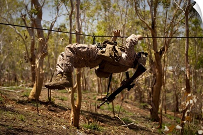 A US Marine Participates In A Gorge Crossing Demonstration