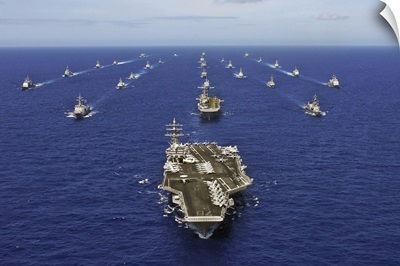 Aircraft carrier USS Ronald Reagan transits the Pacific Ocean with a fleet of ships