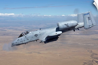 An A-10C Thunderbolt fires its 30mm cannon