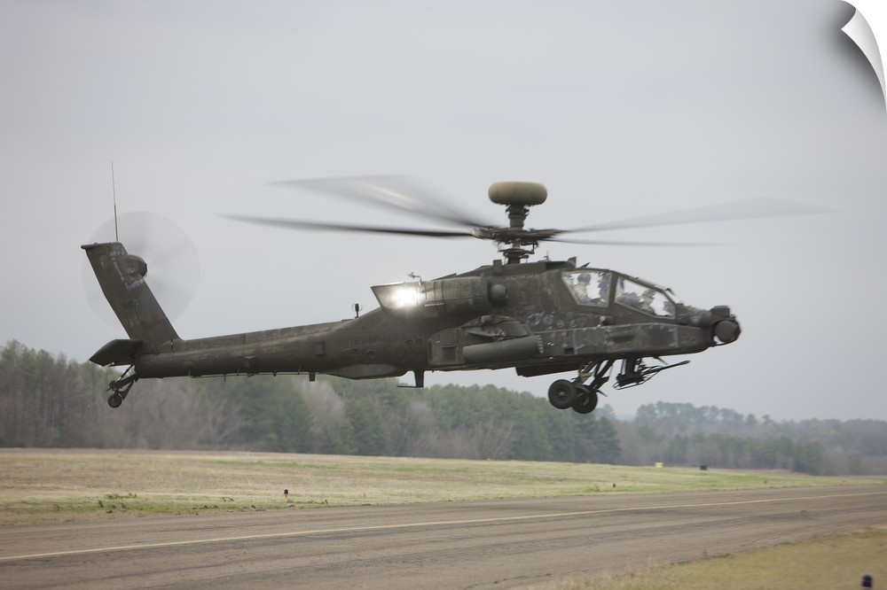An AH-64 Apache helicopter in midair, Conroe, Texas.