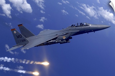 An Air Force F15E Strike Eagle fires flares off the coast of Guam