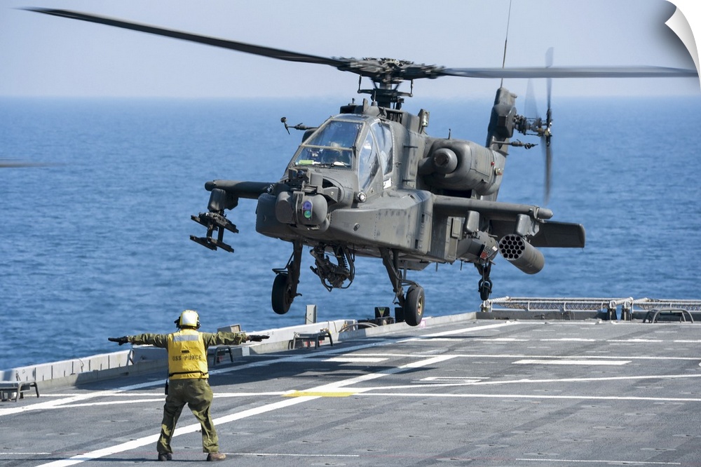 November 11, 2012 - An Army AH-64D Apache helicopter prepares to land aboard the Afloat Forward Staging Base (Interim) USS...