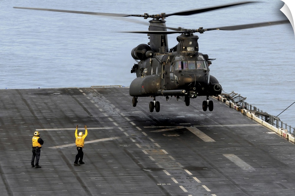 Pacific Ocean, October 9, 2012 - An Army MH-47G Chinook medium assault helicopter conducts deck landing qualifications abo...