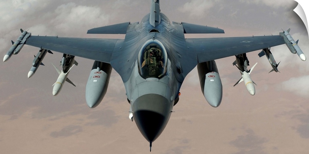An F-16 Fighting Falcon flies a mission in the skies near Iraq.
