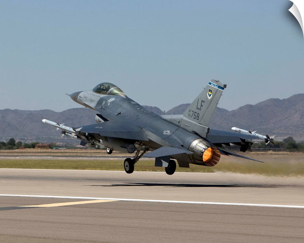 A 56th Fighter Wing F-16 Fighting Falcon from Luke Air Force Base, Arizona, takes off on a training mission.