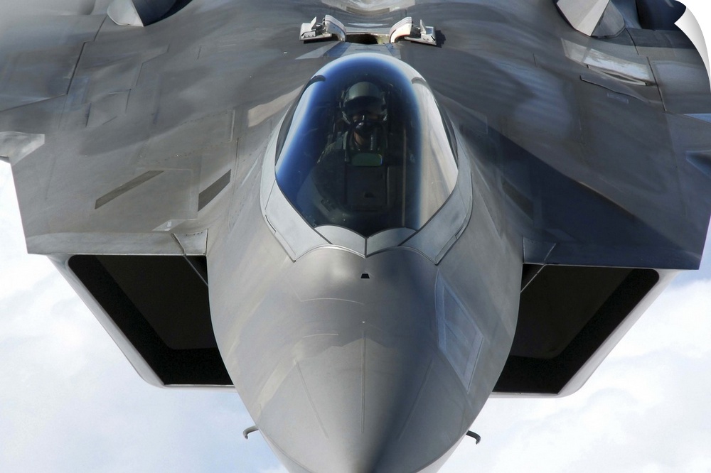 March 31, 2011 - An F-22 Raptor pilot lines up the aircraft to be refueled by a KC-135 Stratotanker.