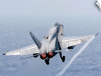 An F/A-18 Hornet taking off