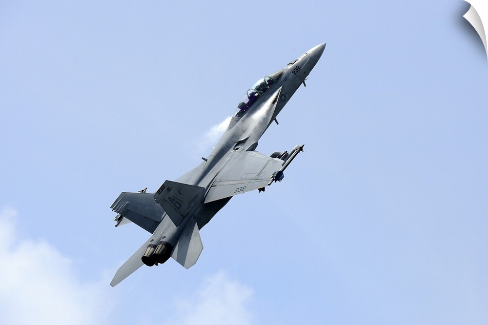An F/A-18 Super Hornet of the U.S. Navy in flight over Langkawi Airport, Malaysia.