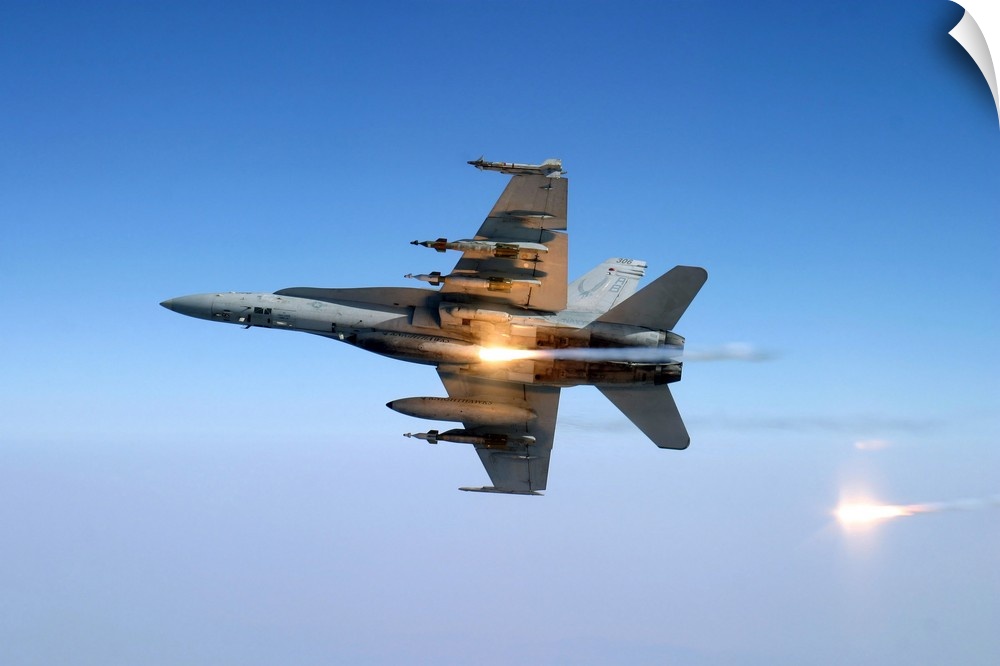 An F/A-18C Hornet aircraft tests its flare countermeasure system.