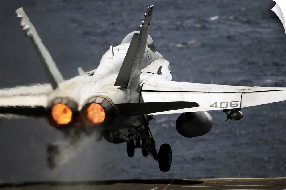 Arabian Sea, May 17, 2012 - An F/A-18C Hornet launches from the Nimitz-class aircraft carrier USS Abraham Lincoln.