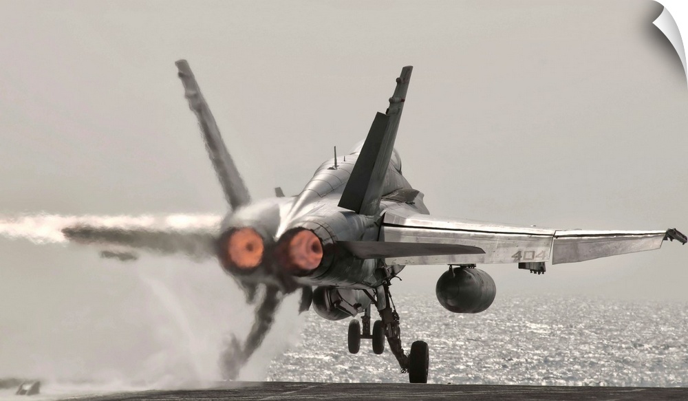 Persian Gulf, October 30, 2011 - An F/A-18C Hornet takes off from USS George H.W. Bush.