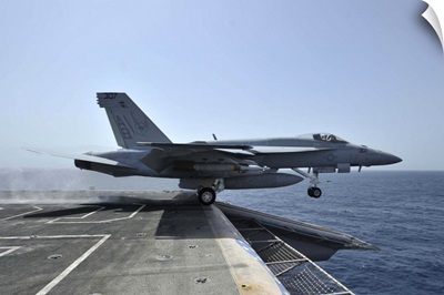 An F/A-18E Super Hornet launches from USS Enterprise